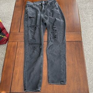 Black ripped straight leg American Eagle jeans. Size:0 regular.